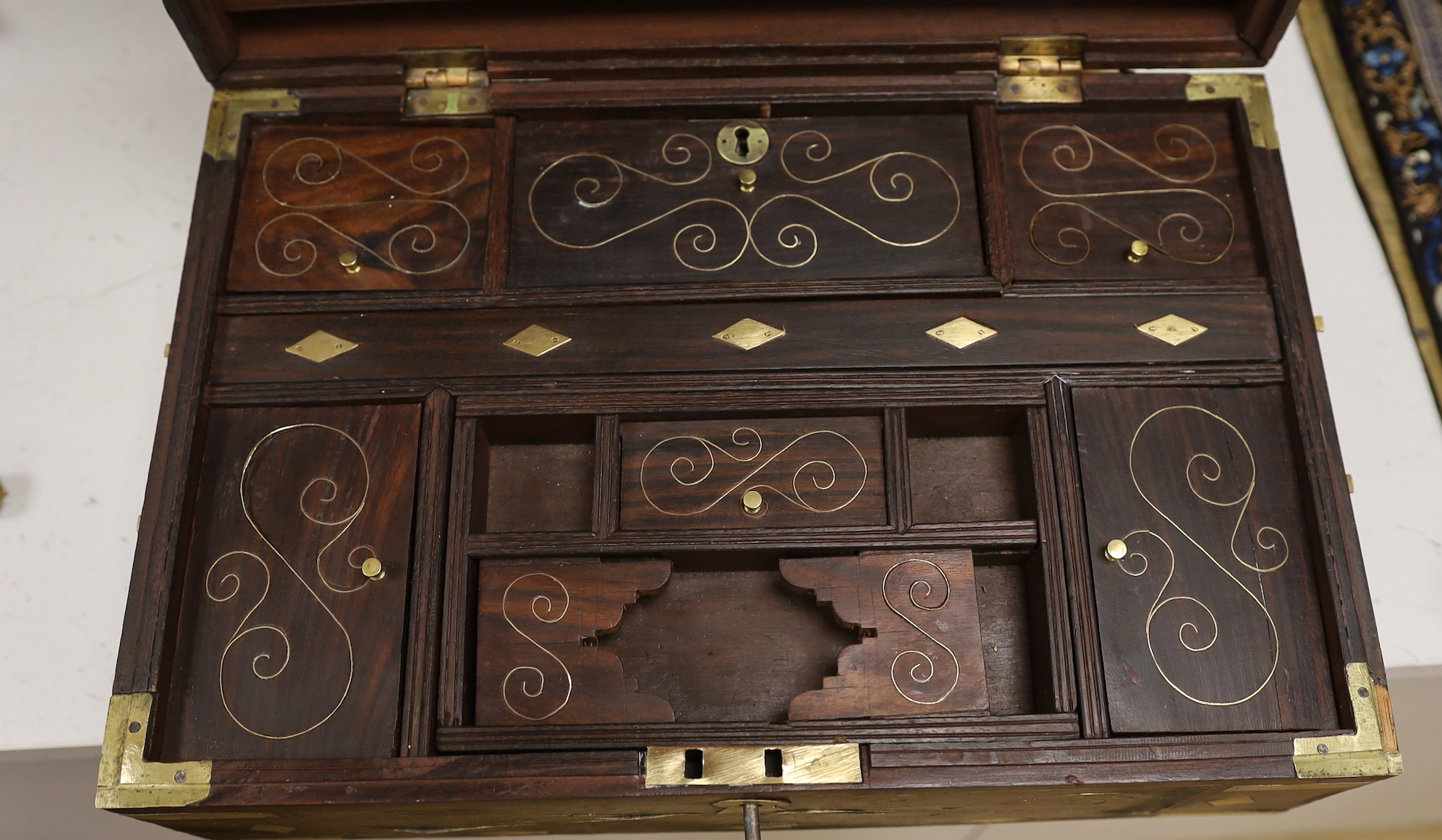 An Indian brass inlaid hardwood box, 41.5cm wide